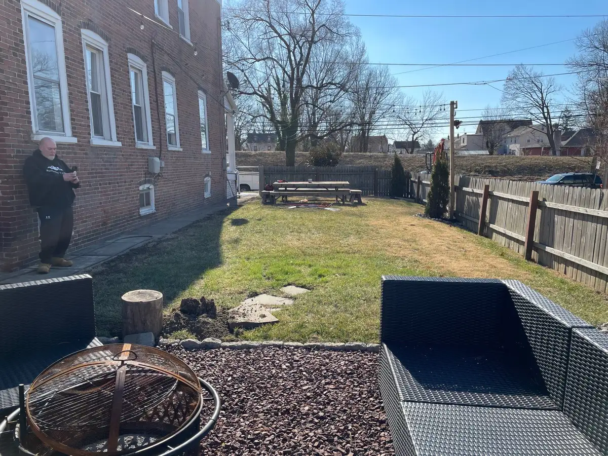 Pond cleanout work around stone and water feature