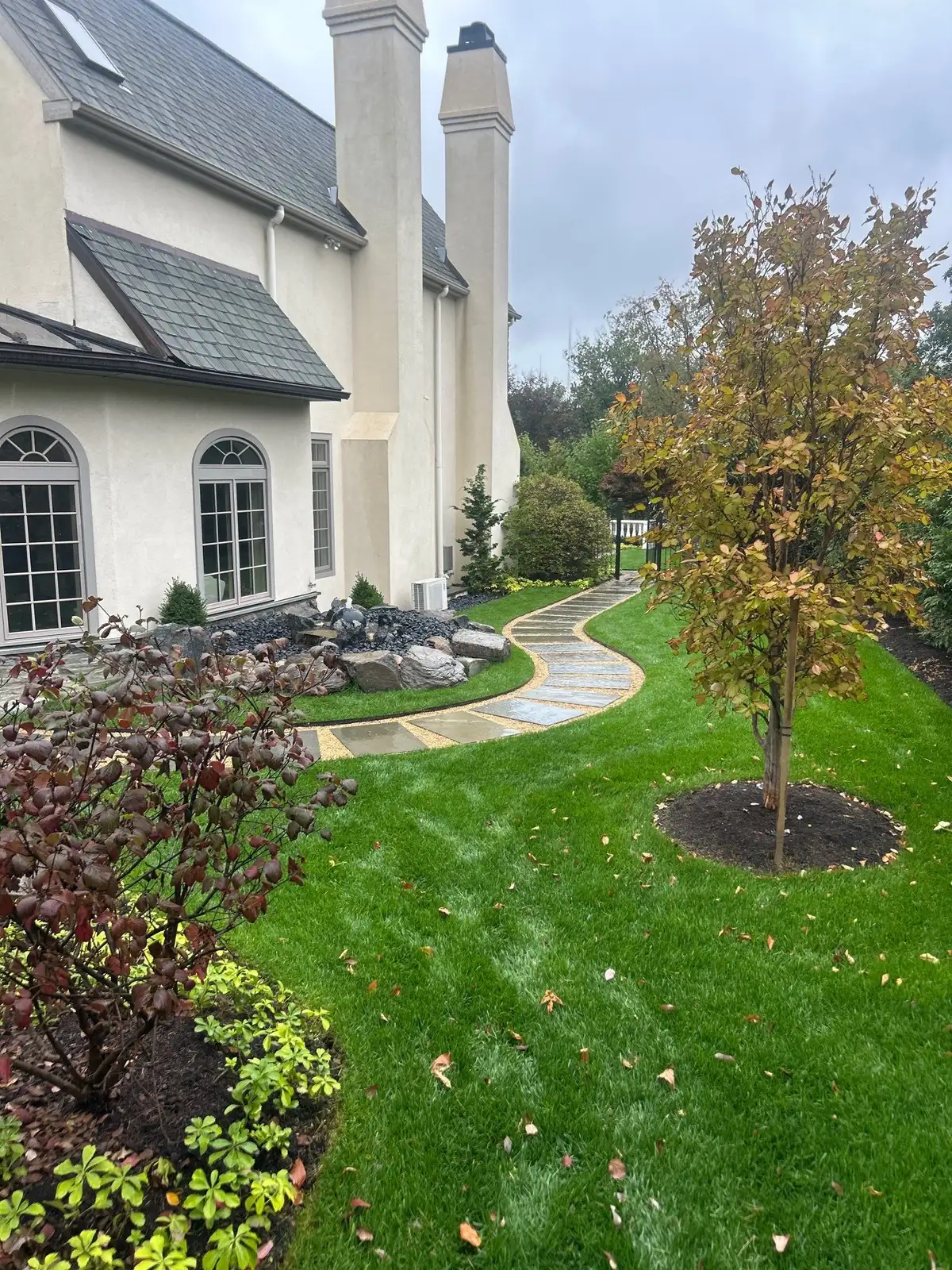 Pond construction with stone and outdoor landscape access