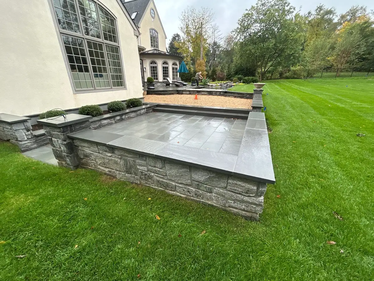 Natural boulder placement during water feature construction