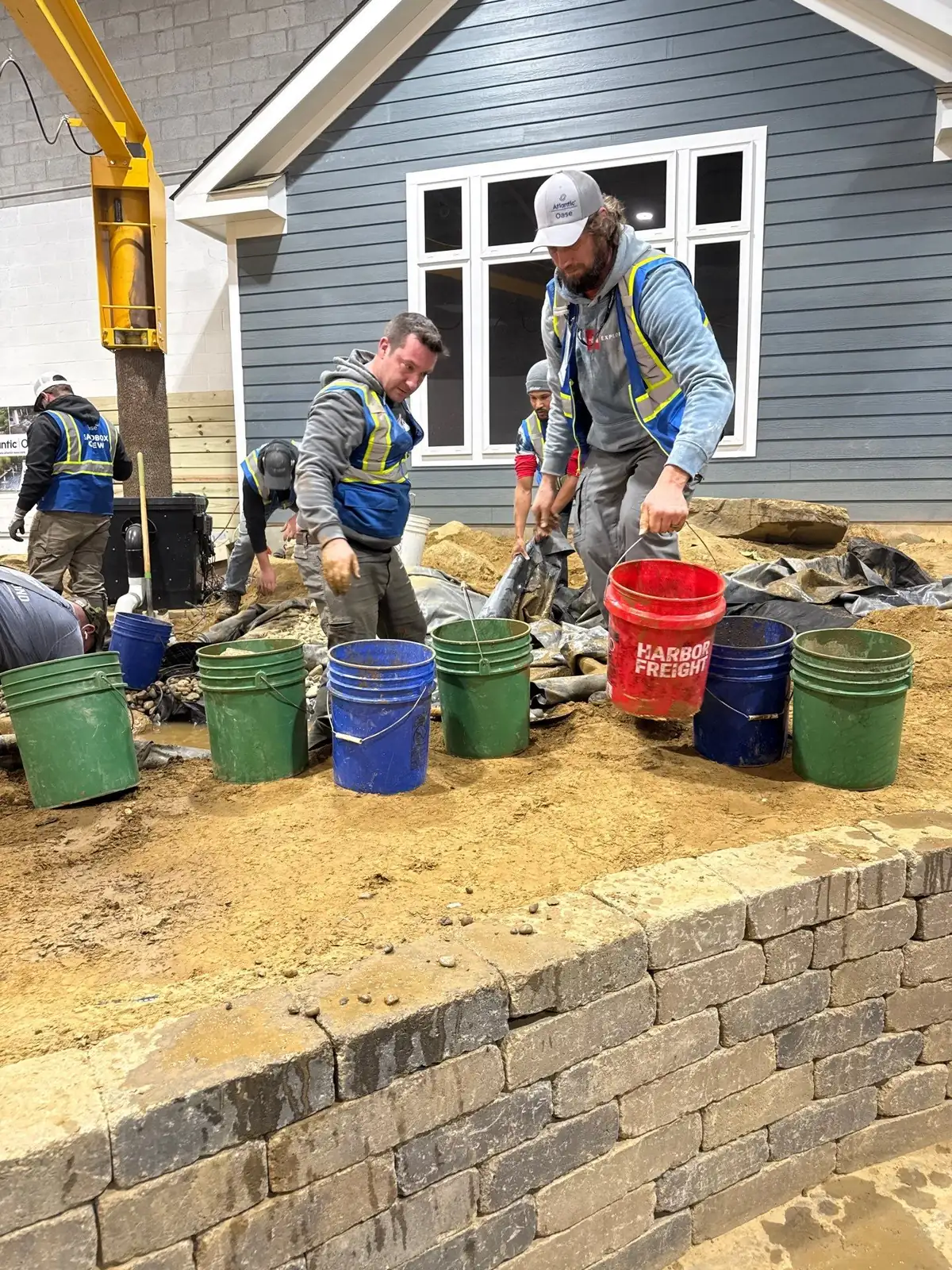 Rock Water Ponds team working on a pond project in Delaware